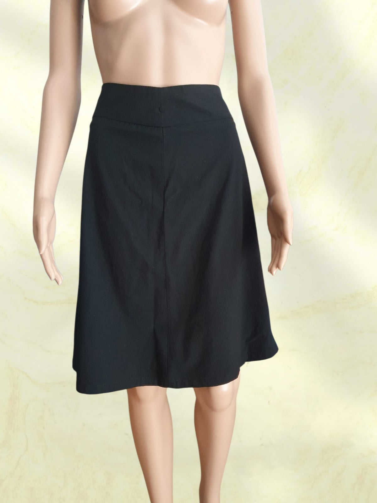 Jupe trapèze noire élégante et fluide – DIM - Taille 40/42